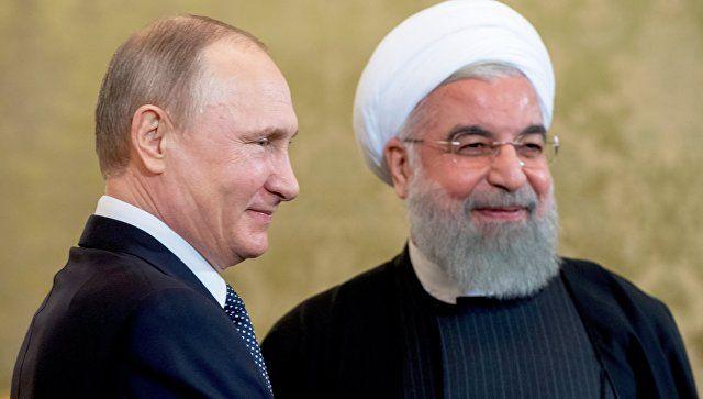 Putin Ruhani ilə Rusiya-İran-Azərbaycan əməkdaşlıq formatını müzakirə etdi