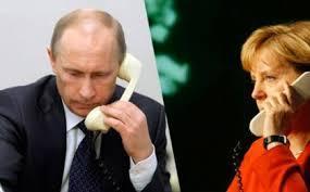 Putin və Merkel Ukraynadan tranzitlə keçən Rusiya qazını müzakirə etdilər