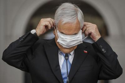 Çili prezidenti maska taxmadığına görə cərimələnib