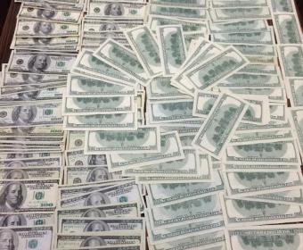 Bakıya külli miqdarda saxta dollar gətirilib