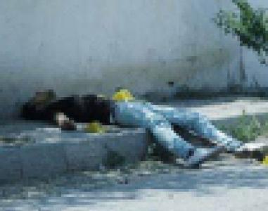 Bakıda 14 yaşlı oğlanın boğazını kəsən ata və anası tutuldu