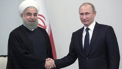 Putin Ruhani ilə görüşdü