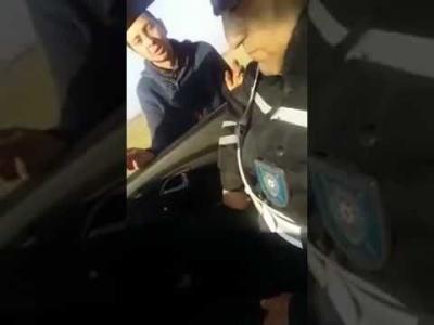 Sürücünün yalvarışlarını videoya çəkən yol polisi əməkdaşı işdən çıxarıldı