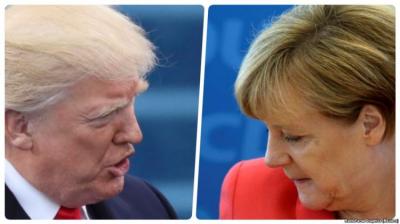 Tramp və Merkel Ag Evdə bir-birlərinə əl vermədilər