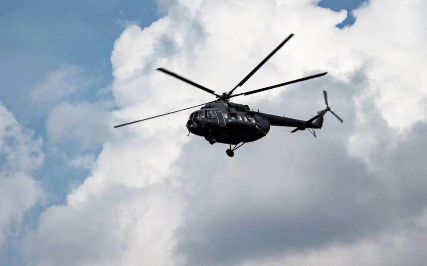 Qazaxıstanda hərbi helikopteri sərt eniş edib - Ölən var