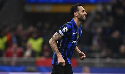 Çalhanoğlu "Arsenal"a vurduğu qoldan danışdı