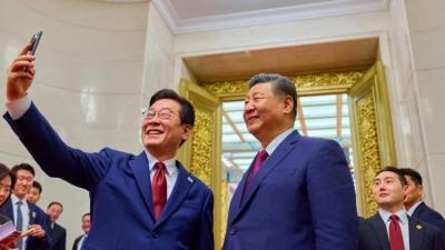 Koreya və Çin liderləri  selfi çəkdirdi
