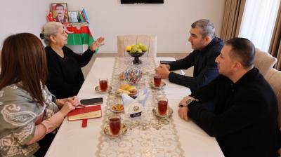 Torpaq Çərşənbəsi münasibətilə Laçın rayonunda şəhid ailələri ziyarət olunub